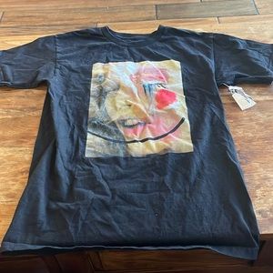 Cute black tshirt- tag still on but the shirt was washed. Never worn